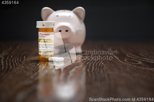 Image of Non-Proprietary Prescription Medicine Bottle, Pills and Piggy Ba