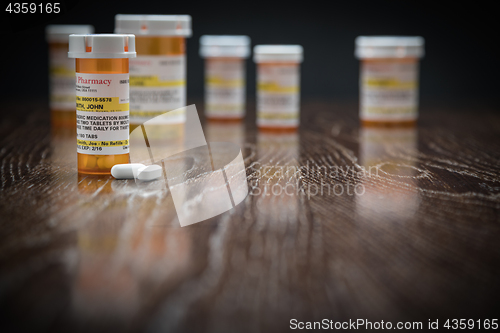 Image of Variety of Non-Proprietary Prescription Medicine Bottles and Pil