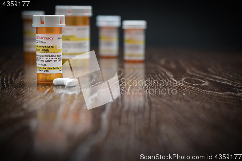 Image of Variety of Non-Proprietary Prescription Medicine Bottles and Pil