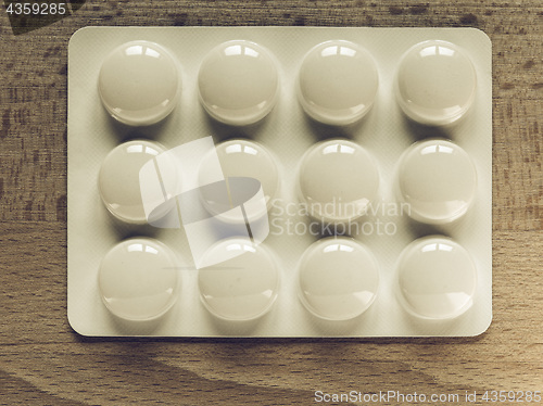 Image of Vintage looking Medical pills on a table