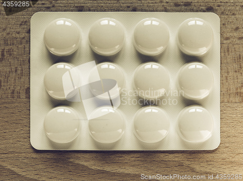 Image of Vintage looking Medical pills on a table
