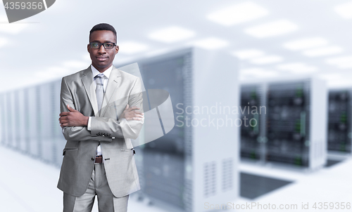 Image of Young black man in server room