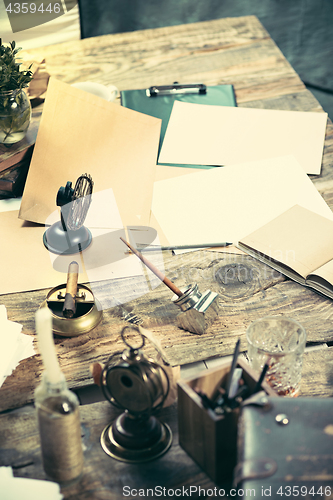 Image of Vintage hipster wooden desktop top view