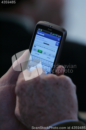 Image of Texting on a Smart Phone