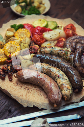 Image of Grilled sausages with vegetables