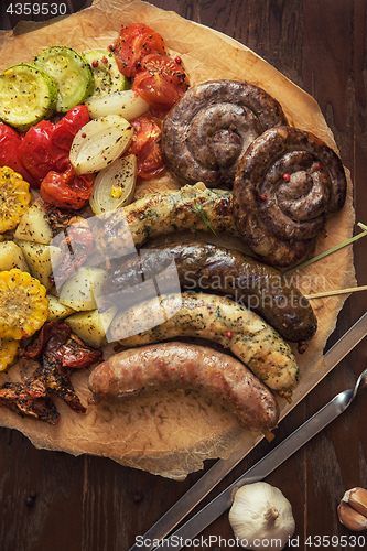 Image of Grilled sausages with vegetables