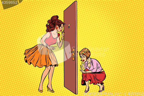 Image of Two women spy on each other through the door