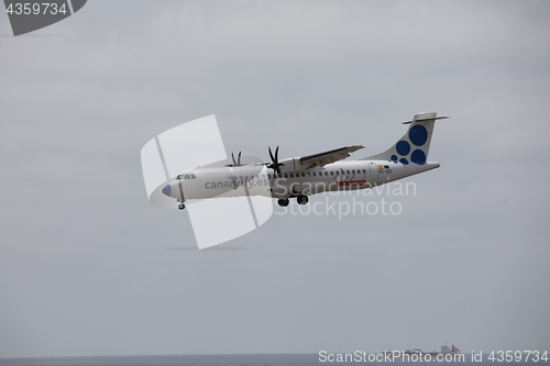 Image of ARECIFE, SPAIN - APRIL, 15 2017: ATR 72 of CANARYFLY.es landing 