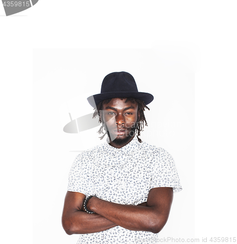 Image of young handsome afro american boy in stylish hipster hat gesturin