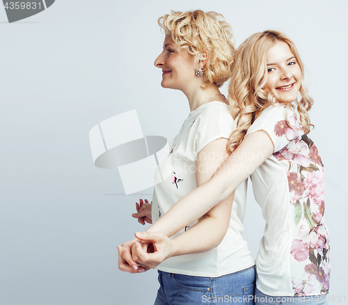 Image of mother with daughter together posing happy smiling isolated on white background with copyspace, lifestyle people concept 