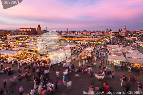 Image of Jamaa el Fna market square in sunset, Marrakesh, Morocco, north Africa.