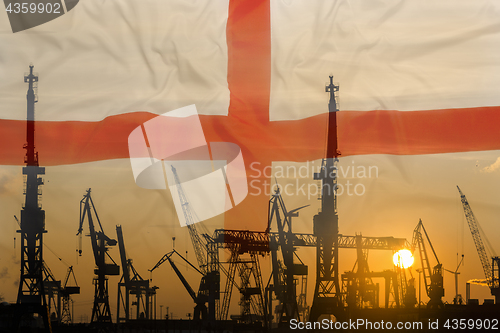 Image of Industrial concept with England flag at sunset