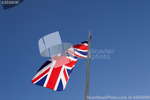 Image of UK flag on a flagpole