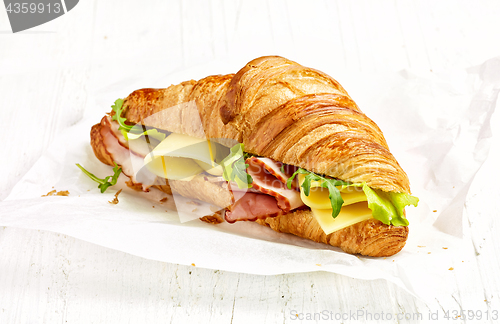 Image of croissant sandwich with ham and cheese