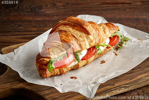 Image of Croissant sandwich with mozzarella and tomato