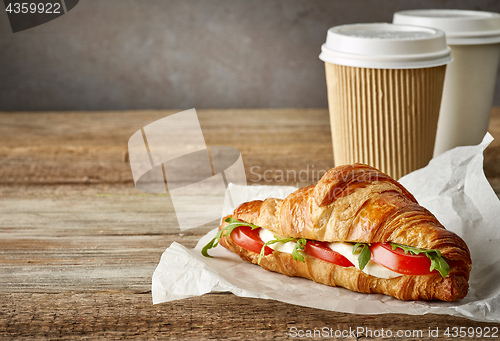 Image of croissant sandwich with tomato and mozzarella