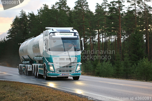 Image of Volvo FH Tank Truck on the Road at Sunset