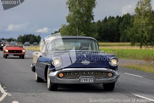 Image of Classic Oldsmobile 88 Car on Highway