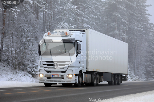 Image of Truck Transport in Winter Fog