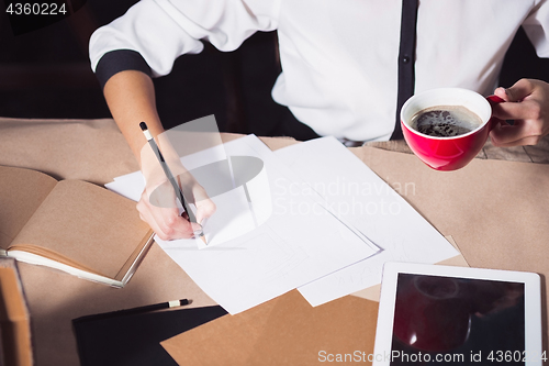 Image of Portrait of a businesswoman who is working at office