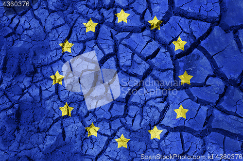 Image of flag of europe on cracked ground background