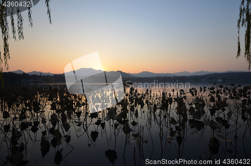 Image of West Lake located at Hangzhou,China in the evening