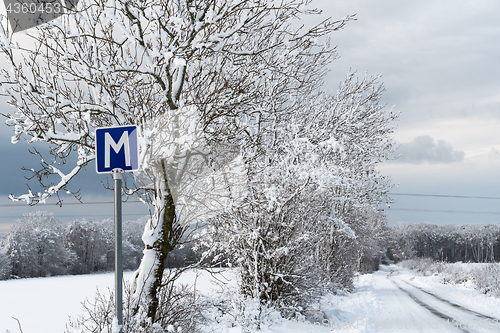 Image of Passing place road sign in winter