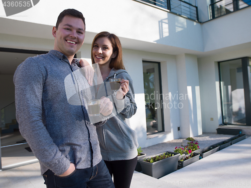 Image of couple enjoying morning coffee