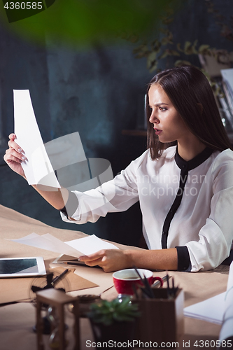 Image of Portrait of a businesswoman who is working at office