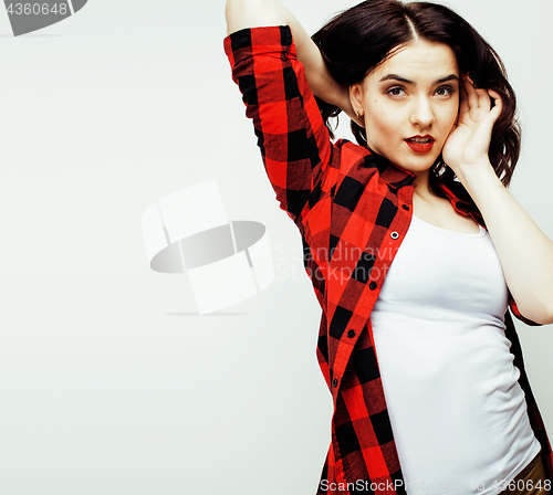 Image of young pretty stylish hipster girl posing emotional isolated on w