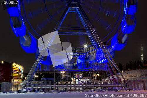 Image of Ferris wheel in night city