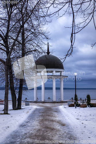 Image of Path to rotunda on lake in winter