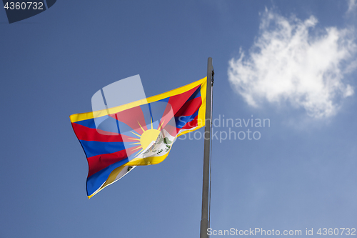 Image of National flag of Tibet on a flagpole