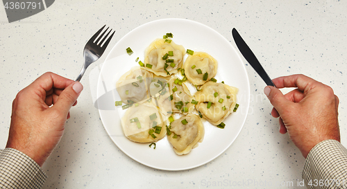 Image of Meat dumplings in front of visitor