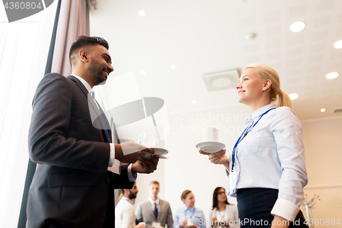 Image of happy business team at international conference