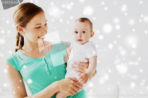 Image of happy young mother with little baby
