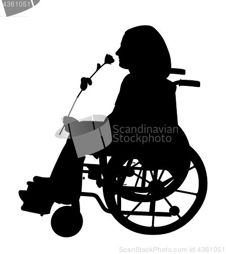 Image of Disabled person in wheelchair smelling rose and waiting for someone