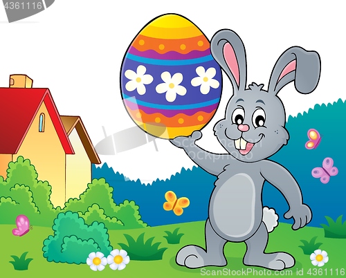 Image of Bunny holding big Easter egg topic 2