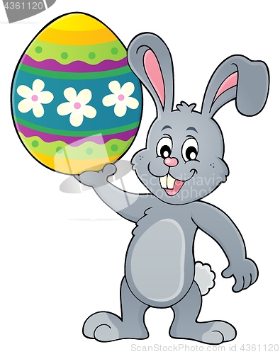 Image of Bunny holding big Easter egg topic 1