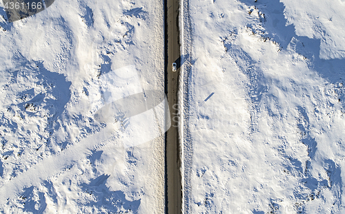 Image of Aerial car on icy road\r