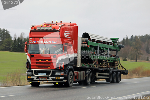 Image of Customized Scania Truck Hauls Machinery