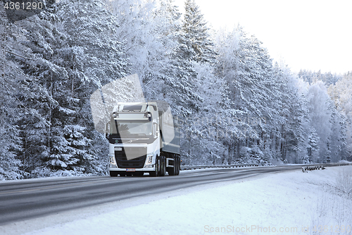 Image of Winter Landscape with White Volvo FH Truck