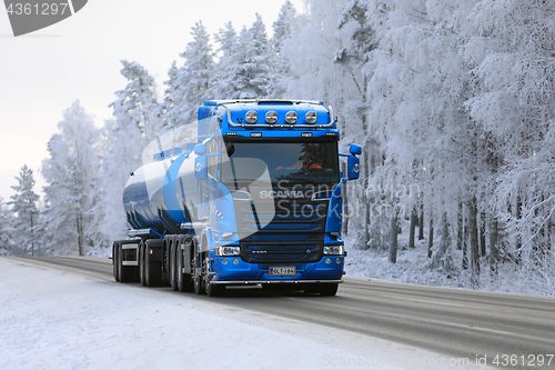 Image of Blue Scania Tank Truck on Winter Road