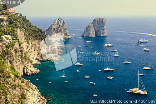 Image of Faraglioni rocks, Capri island, in sunset