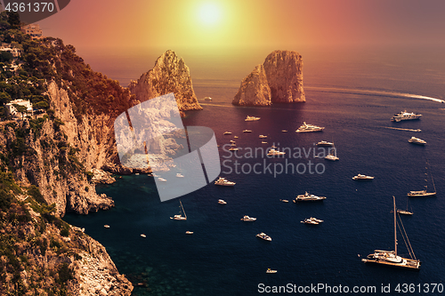 Image of Faraglioni, Capri island, in sunrise light