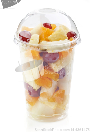 Image of fresh fruit pieces salad in plastic cup