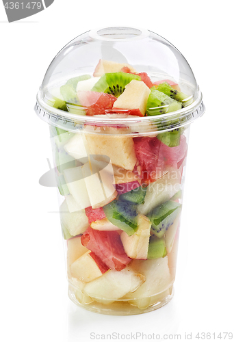 Image of fresh fruit pieces salad in plastic cup