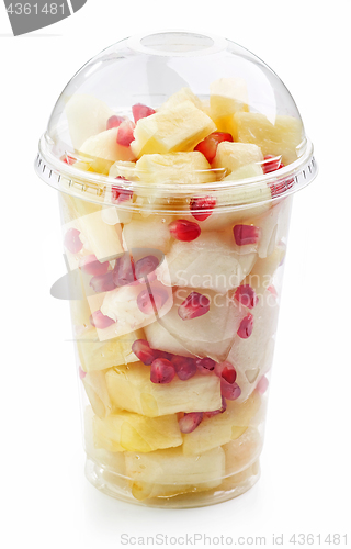 Image of fresh fruit pieces salad in plastic cup