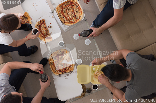 Image of Pizza time a group of people