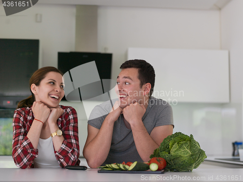 Image of Young couple in the kitchen